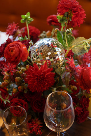 red flower disco ball centerpiece