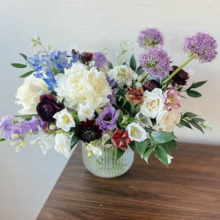 Fresh flower arrangements available for delivery and pickup at Plum Social Denver