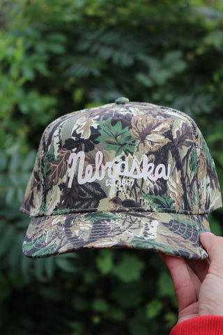 Nebraska Wave Camo Hat - Plum Sage Flowers