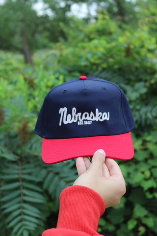 Nebraska Wave Navy/Red Hat - Plum Sage Flowers