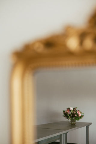 Fresh flowers on the design table at Plum Social Denver studio